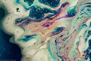 The colors pooling out of a bath bomb create something almost topographical in their abstraction.