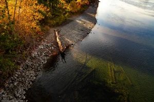 The south bank of the Clark Fork River as seen from above on a late afternoon in October. Cozy, clear, and peaceful.