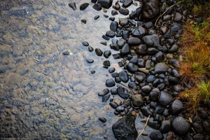 A simple shot of the rocks along the bank of the Yaak River.