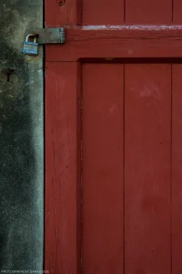 The minimalist lines of a locked wooden door at Fort DeSoto, on Florida’s Gulf Coast.