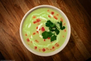 A creamy chicken soup made with roasted poblano peppers.